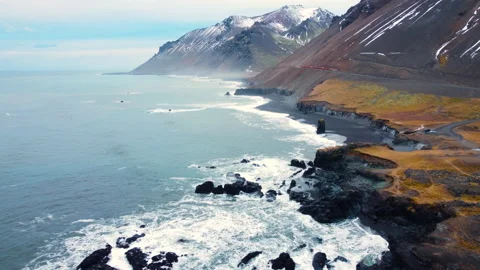 Aerial top view of waves break on rocks in a blue ocean. Sea waves on beautiful Stock Footage 167656230