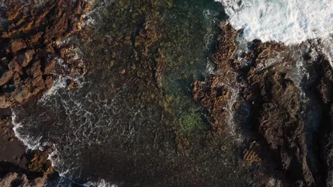 Aerial Top View Waves Crashing on Lava Rocks, Tenerife, Canary Islands Stock Footage 336317765