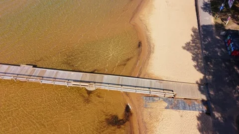 Aerial top view of where sand beach meet clear water, varamon motala Stock-Footage 315536746