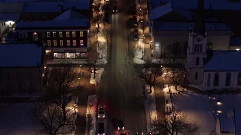 Aerial top view of winter night intersection in USA with moving traffic Stock Footage 334154454