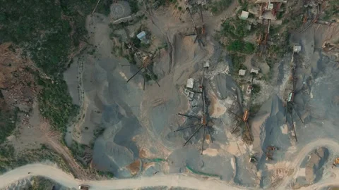 Aerial topdown shot of A large scale earthworks extraction facility Stock Footage 343029946