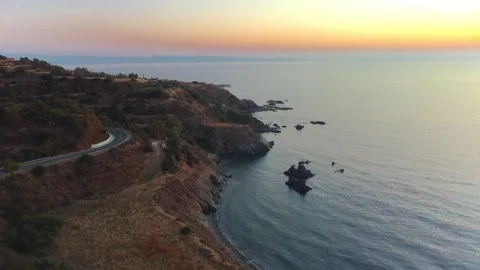 Aerial topdown of sunset, linear shot over the coast in Pomos, Cyprus Stock Footage 165898771