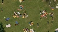 Aerial Of Tourists Relaxing On Green Lawn In The Park, Swimming Pools Stock Footage
