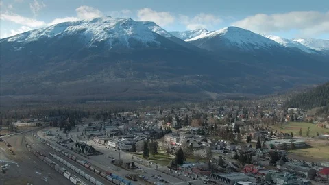 Aerial: town of Jasper in the Canadian Rocky Mountains.  Alberta, Canada. Stock Footage