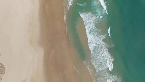 Aerial, tracing Byron Bay beach shoreline Stock Footage