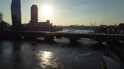 Aerial Track Across River Thames by Blackfriars Bridge at Sunset Stock Footage 149843390
