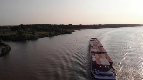 Aerial Tracking Across Bow Of Cargo Ship Devotion Going Past On Oude Maas Stock-Footage 158282983