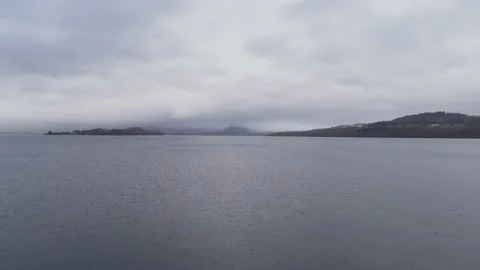 Aerial Tracking Back Over Loch Lomond, Scotland Stock Footage 107313511