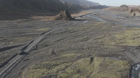 Aerial Tracking Behind 4x4 on Remote Dirt Road with Passing Vehicle Stock Footage 331662705