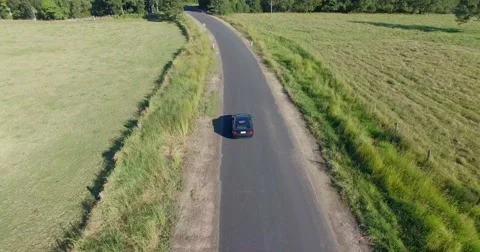 Aerial tracking of car on road Stock-Footage 63852393