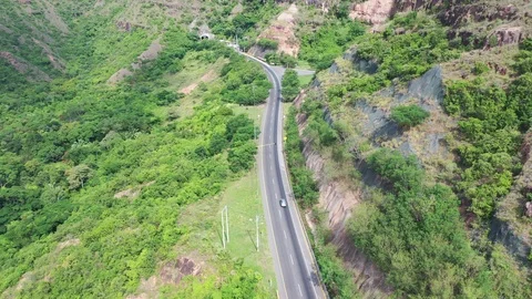 Aerial Tracking car for the road until tunnel Vídeos de archivo 120654860