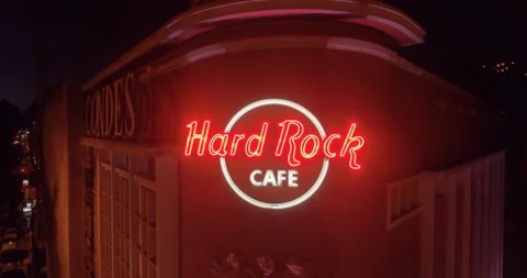 Aerial Tracking Close Up of the Facade of the Hard Rock Cafe Lisbon Stock Footage 90245387
