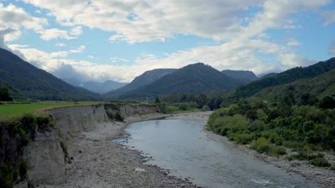 Aerial tracking down a river in New Zealand Stock Footage 155465892