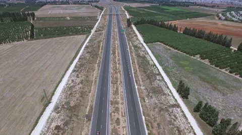 Aerial tracking of a long road Stock Footage 54287355