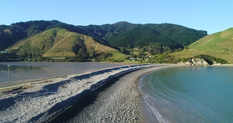 Aerial tracking of natural boulder causeway,Nelson,Cable Bay, New Zealand Stock Footage 140624810