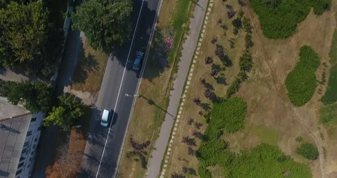 Aerial Tracking Shot Of Car Moving On A Road Stock Footage