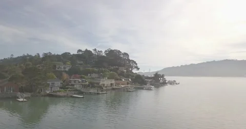Aerial Tracking Shot of Docks and Golden Gate Bridge 库存影片 146297801
