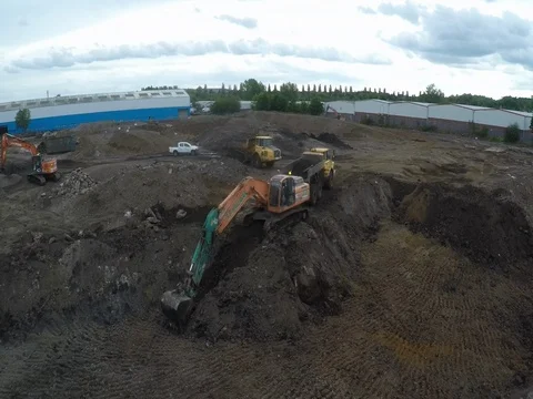  Aerial Tracking shot of Excavators digging the ground Stock Footage 84762291