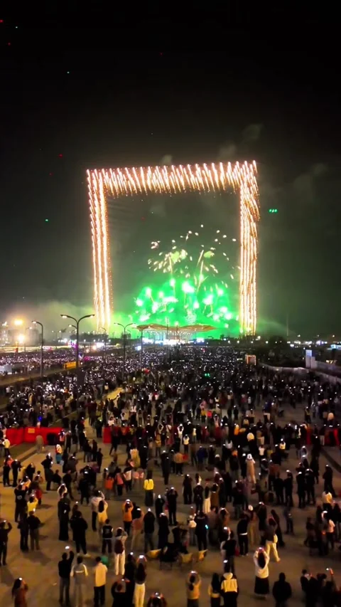 Aerial Tracking Shot of Gate-Shaped Fireworks with Petal Effects in China Stock-Footage 328964663