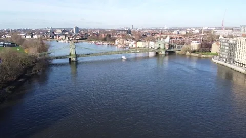 Aerial Tracking Shot of Hammersmith Bridge in London On A Sunny Winter Day Stock Footage 135423679