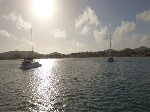Aerial tracking shot inbetween 2 yachts in St Lucia Stock Footage 81749048