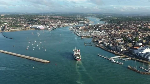 Aerial tracking shot of loaded car ferry. Cowes, Isle of Wight Stock Footage