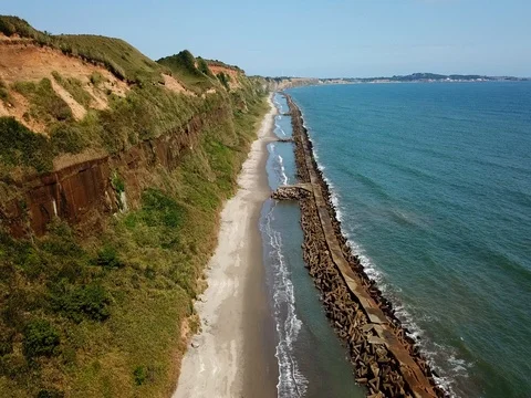 Aerial tracking shot of marine cliffs of Byobugaura Stock Footage 80077835