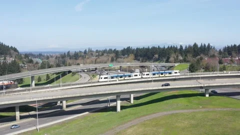 Aerial tracking shot of MAX light trail passenger train in Portland Oregon. Stock-Footage 161627738