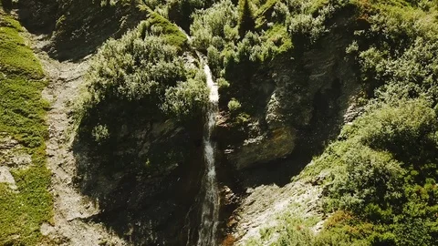 Aerial tracking shot of river waterfall in forest during summer Video stock 116325665