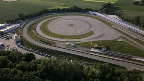Aerial tracking shot of a transportation research facility in Bavaria showing 스톡 동영상 340891771
