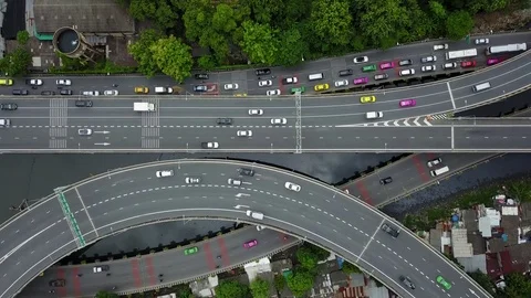 Aerial tracking shot view from the drone on the highway of Bangkok,Thailand Stock Footage 77706476
