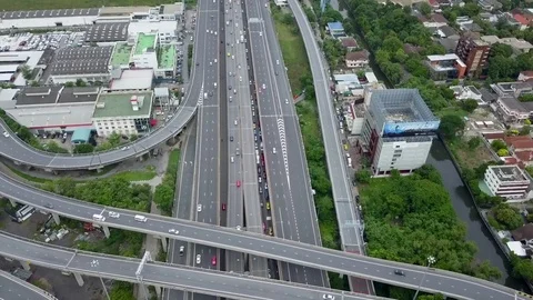 Aerial tracking shot view from the drone on the highway of Bangkok,Thailand Stock Footage 77734183