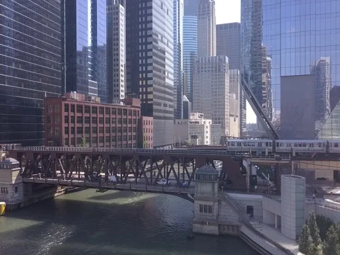 Aerial tracking a train over water 库存影片 80313654