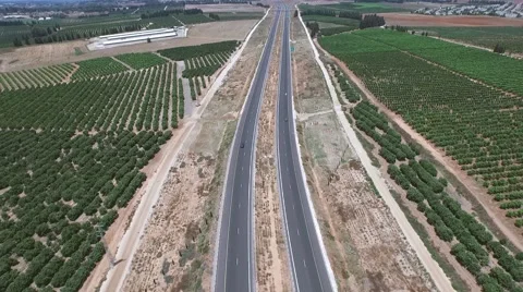 Aerial tracking of turnpike Stock Footage 54285471