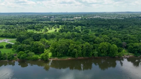 Aerial Tracking View of Algonkian Regional Park Riverbank Stock Footage 342132022
