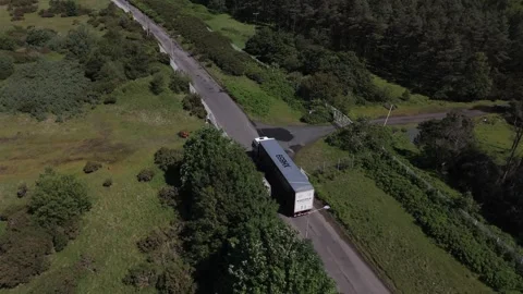Aerial Tracking View of Articulated Lorry on Rural Scottish Road 库存影片 339301245