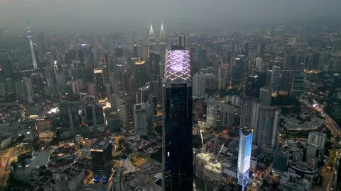 Aerial tracking view the TRX skyscraper in evening night Vídeos de archivo 227319360