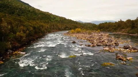Aerial: Tracking Whitewater Rafting On Crystal Clear River In Patagonia Vacation Stock Footage 64674953