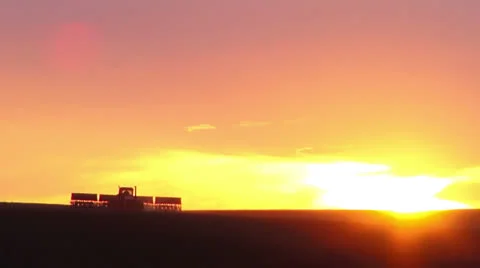 Aerial - Tractor seeding spring wheat Stock-Footage 22485175