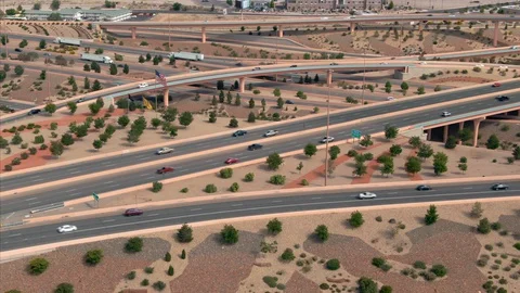 Aerial: Traffic on a freeway interchange. Albuquerque, New Mexico, USA Stock Footage 129807030