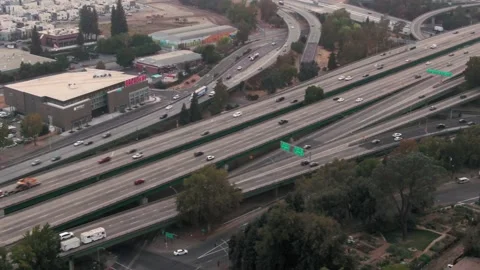 Aerial: Traffic on the Interstate 80 freeway. San Francisco, California, USA Stock Footage 162147939