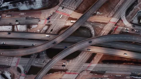 Aerial traffic jam interchange road in evening, cars driving junction highway Stock Footage 169323398