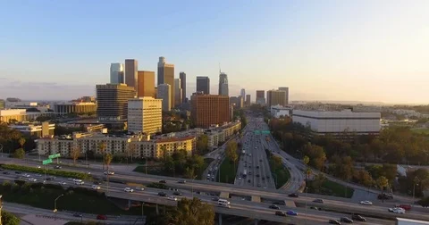 Aerial of traffic moving on intersecting bridges at dusk Video stock 81532392
