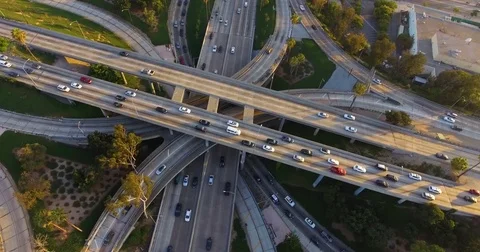 Aerial of traffic moving on intersecting highways 스톡 동영상 81532757