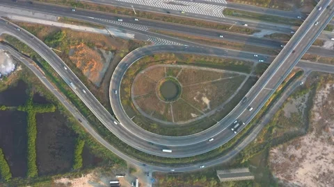 Aerial Traffic of ring roads, expressways, motorways, and highways at day tim Video stock 168880978