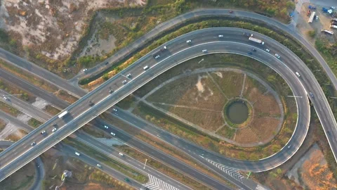 Aerial Traffic of ring roads, expressways, motorways, and highways at day tim Video stock 168884078
