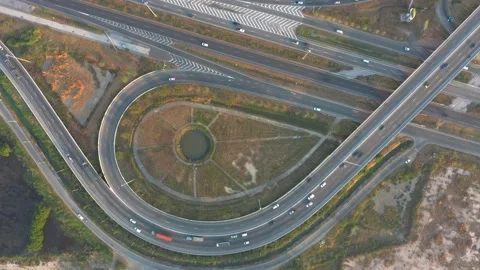 Aerial Traffic of ring roads, expressways, motorways, and highways at day tim Video stock 168884460
