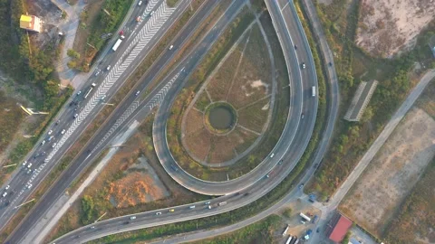 Aerial Traffic of ring roads, expressways, motorways, and highways at day tim Stock Footage 170770616