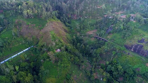 Aerial. Train from Ella to Kandy in mountains. Sri Lanka. Stock Footage 103956680