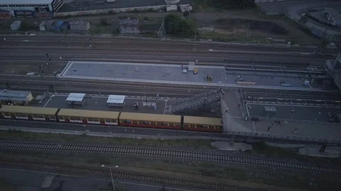 Aerial - Train entering station Stock Footage 85951660